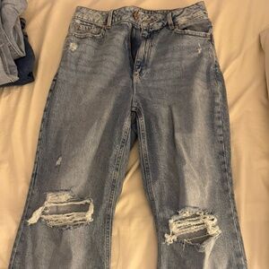 wide leg ripped knee jeans